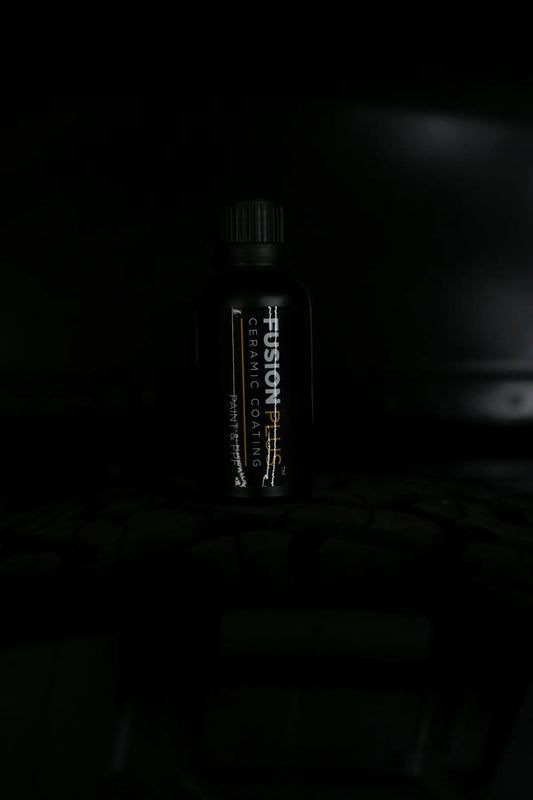 a bottle of energy drink sitting on top of a table