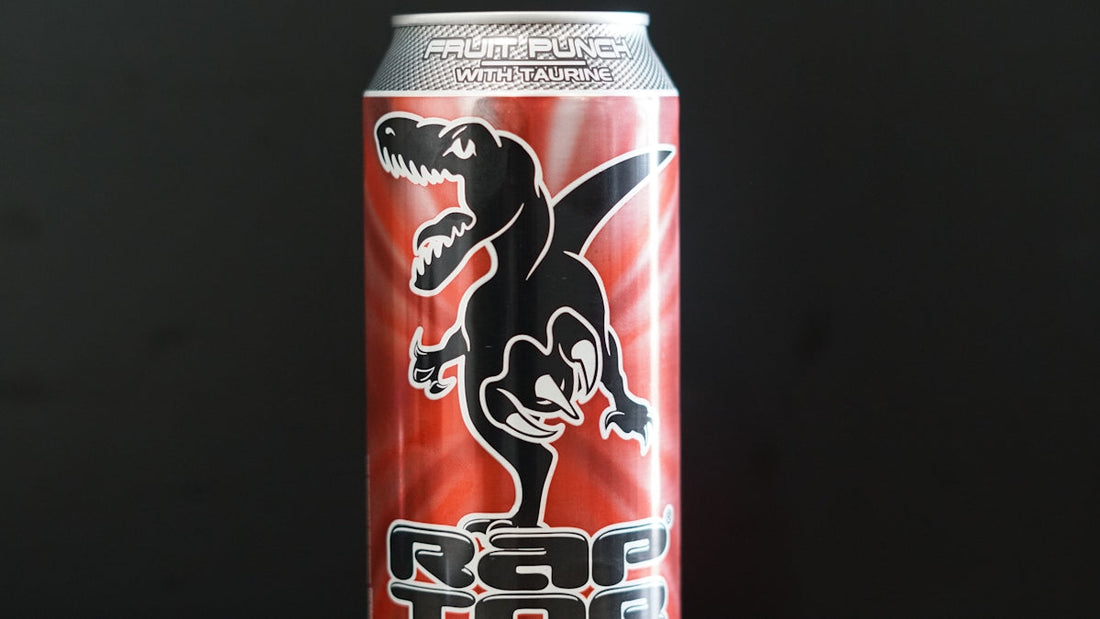 A can of raptor energy drink with a dinosaur graphic.