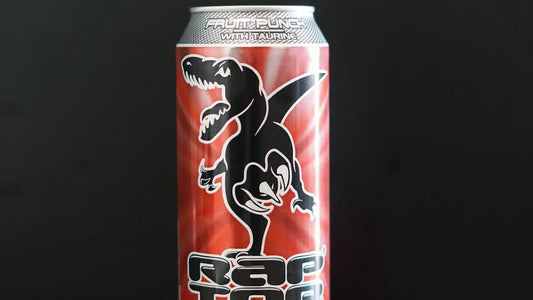 A can of raptor energy drink with a dinosaur graphic.